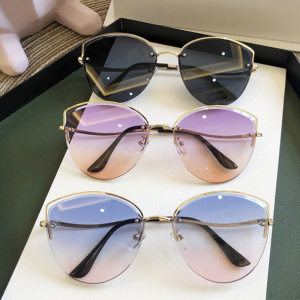 High Quality women's Oval Cat Eye Sunglasses Lady Metal Rimless shades Luxury Sunglasses Female Driving Glasses zonnebril dames