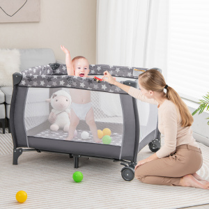 Portable Baby Playard with Changing Table, Bassinet, and Music Box - Additional Image